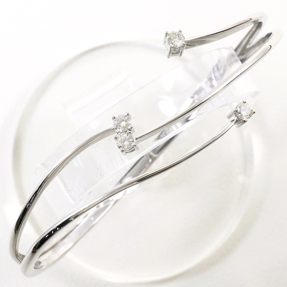 18K (18-karat white gold) bangle with 0.45ct diamond, includes appraisal cert...